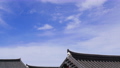 peaceful clouds passing over the roof of traditional korean hanok 81569293
