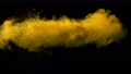 Super slowmotion shot of yellow powder explosion isolated on black background. 82031310