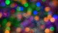 Defocused Xmas lights festive decorations, abstract blurry bokeh background effect. Holiday concept backdrop, twinkling bright shapes. Out of focus glowing celebration texture for use graphic design. 84786436