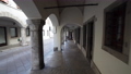 The arcades in via Giuseppe Bini in Gemona del Friuli	 85303501