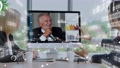 Creative visual of business people in a corporate staff meeting on video call 85922634