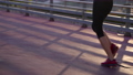 sportswoman in morning jogging training, closeup of feet in sporty sneakers 86100018