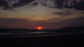 4K footage of a sunset on the beach with a stunning outdoor landscape in the background. 89298190