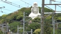 横須賀線　田園（電下）踏切から見た大船観音 89570805
