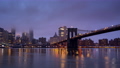 Timelapse of Manhattan skyline and Brooklin bridge at foggy sunrise 90357723