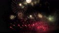 Glowing fireworks celebration at night sky 91050518