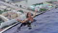 Attractive woman in swimming pool on roof 92377551