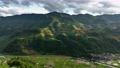 Aerial view drone flight backward over Long Coc tea hill, Phu Tho province, Vietnam 92385673
