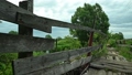 Old destroyed wooden bridge across river 92673660