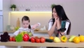 Happy mother and daughter enjoy prepare freshly salad together in kitchen. diet and Health concept. 93154495