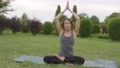 Namaste above head yoga pose, Woman hands clasped in namaste in slow motion 4k. 93413309