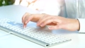 Female hands busy working on computer keyboard for sending emails 94242981