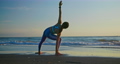 woman practice yoga on beach 94362745