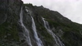 Aerial view of Sofia waterfalls. Epic view of falling water jets high in the mountains on a summer day 94578630