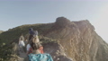 Family climbing up mountain hill, walking along hiking trail. 96522287