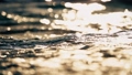 Slow motion shot of sparkling sun reflections on the sea 96575448