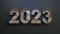 The new year 2023 is made from the mechanical alphabet with gear 98315490