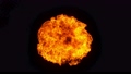 Super slow motion of fire explosion on black background. Filmed on high speed cinema camera 98579462