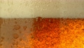 Super slow motion of macro shot of beer drink bubbling, close-up. Filmed on high speed cinema camera, 1000 fps. 98579465
