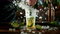 Super slow motion of making mojito cocktail with camera movement. Speed ramp effect. Filmed on high speed cinema camera with cinebot, 1000 fps. 98659636