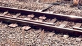 [Slow motion] close-up of train tracks passing by 100169945