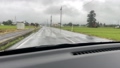 Rainy day Car driving in the countryside slow 106189408